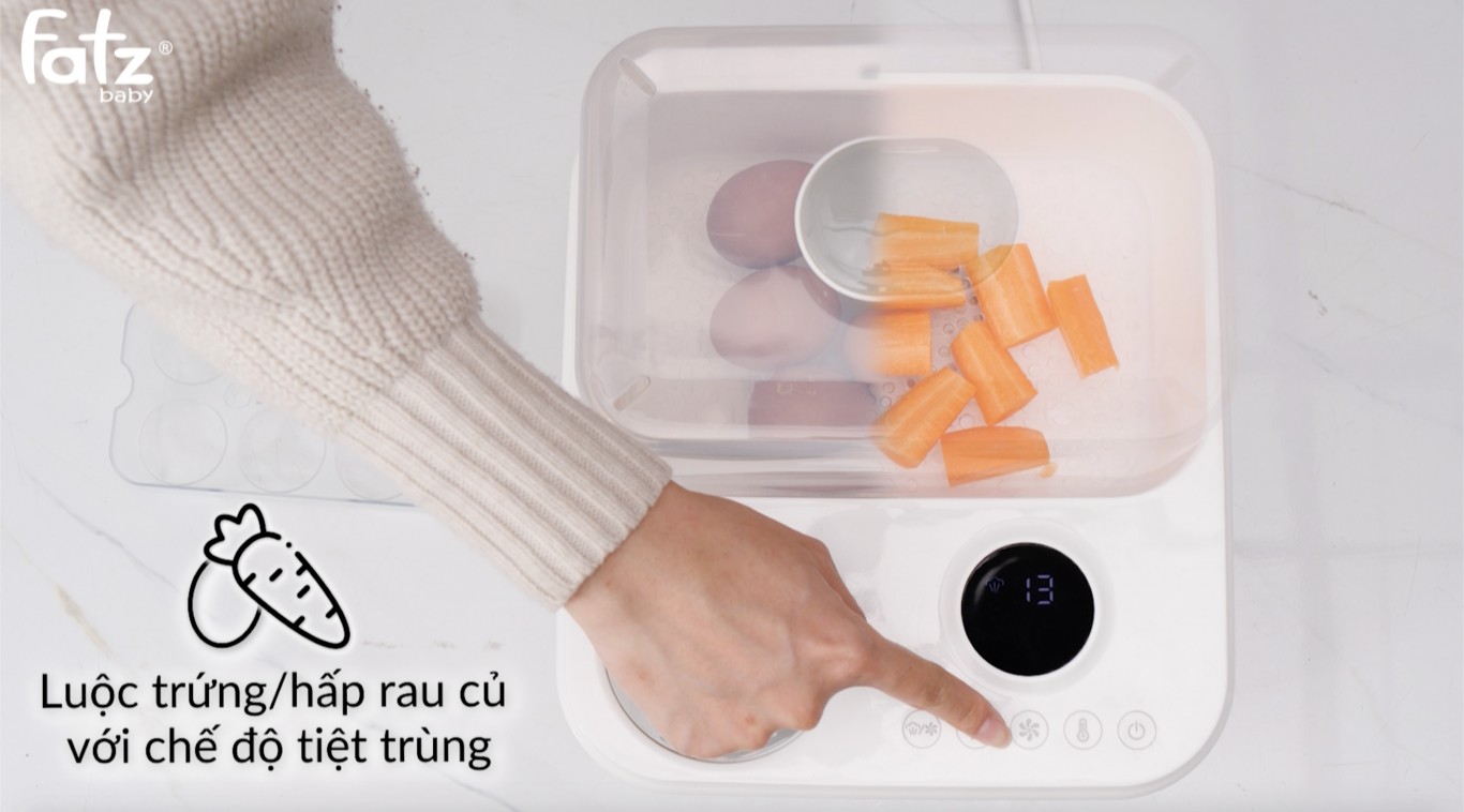 Với máy hâm sữa tiệt trùng Fatz mẹ có thể luộc trứng, hấp rau củ bằng chế độ tiệt trùng 
